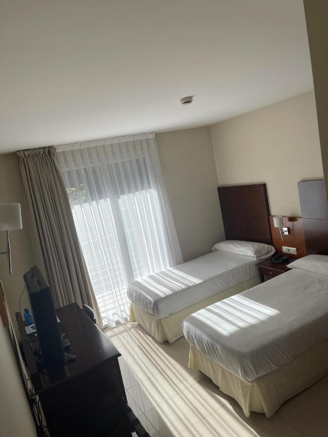 Hotel Mu La Cortinada Esterno foto